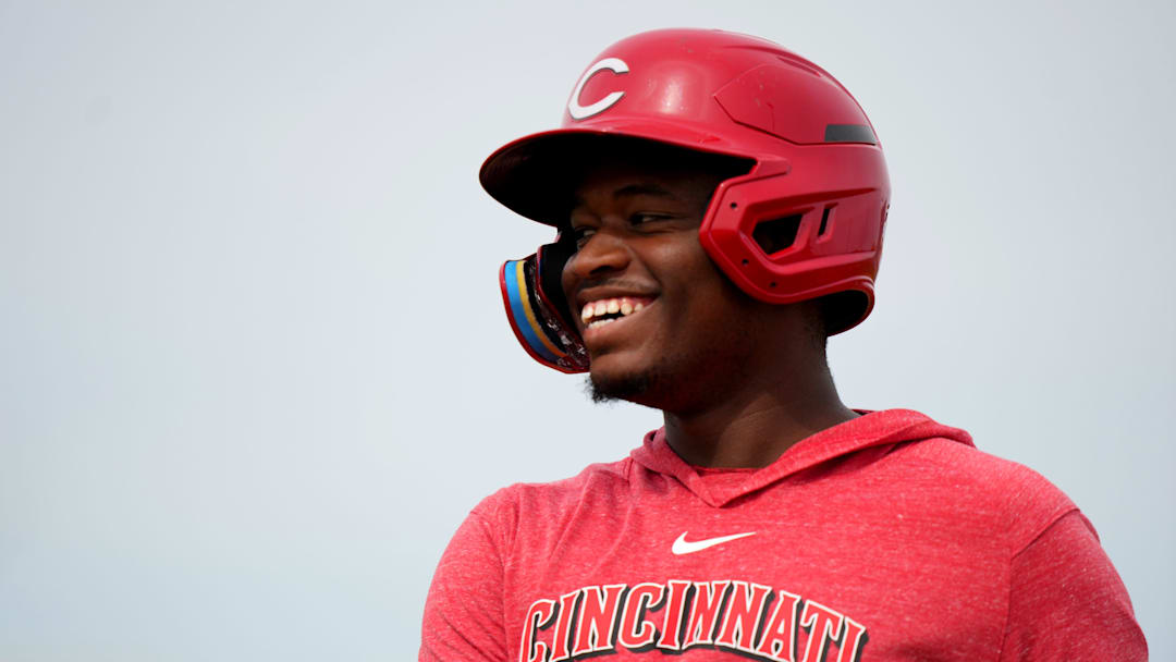 Cincinnati Reds minor league player Cam Collier serves as a baserunner during rundown drills during spring training workouts, Friday, Feb. 23, 2024, at the team   s spring training facility in Goodyear, Ariz.