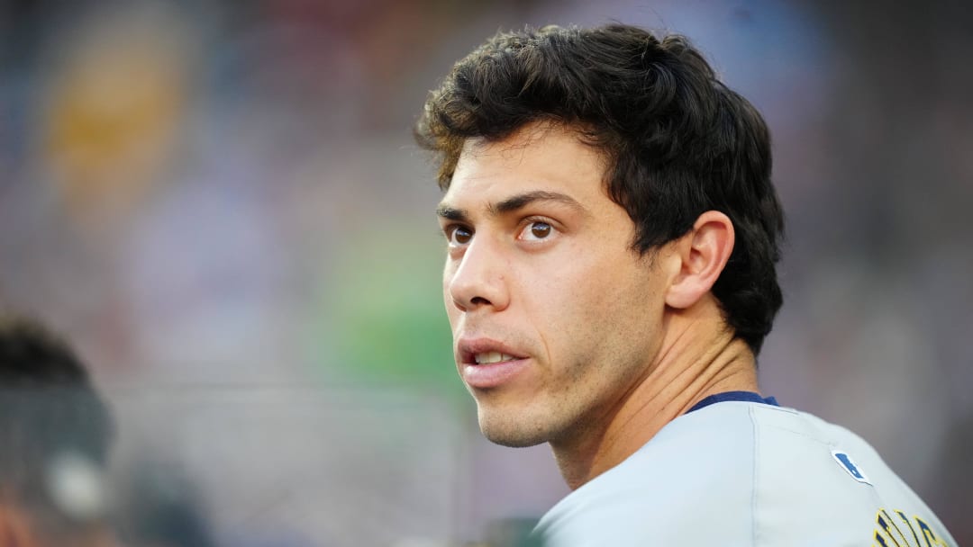 Jul 2, 2024; Denver, Colorado, USA; Milwaukee Brewers outfielder Christian Yelich (22) during the sixth inning against the Colorado Rockies at Coors Field. Mandatory Credit: Ron Chenoy-USA TODAY Sports