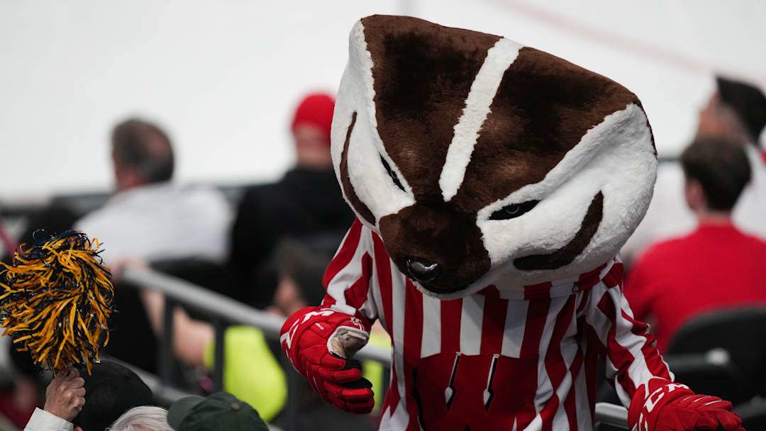 Apr 9, 2026; Las Vegas, Nevada, UNITED STATES; Wisconsin Badgers mascot Bucky Badger interacts with fans in the third period against the North Dakota Fighting Hawks in the semifinals of the NCAA men's ice hockey Frozen Four at T-Mobile Arena. Mandatory Credit: Lucas Peltier-Imagn Images