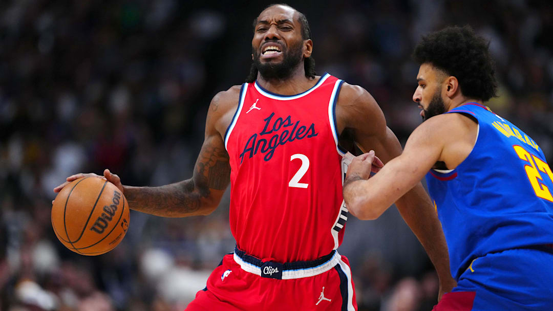 LA Clippers forward Kawhi Leonard (2) and Denver Nuggets guard Jamal Murray (27) in the first quarter during game seven of first round for the 2025 NBA Playoffs at Ball Arena. 