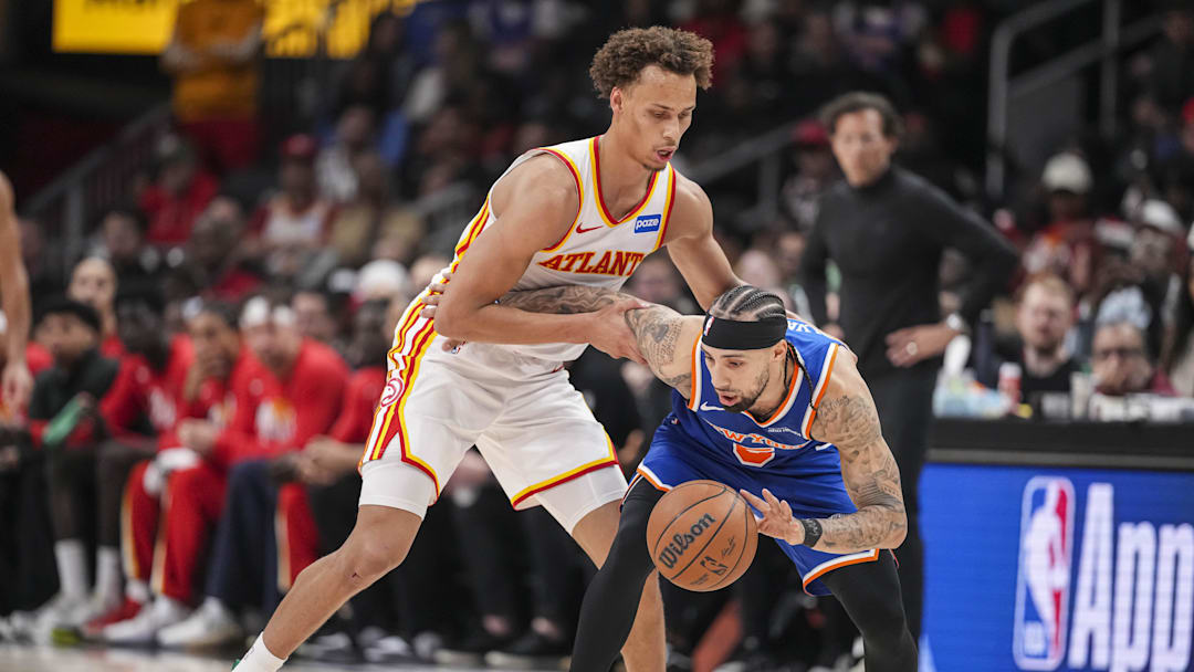 Apr 25, 2026; Atlanta, Georgia, USA; New York Knicks guard Jose Alvarado (5) dribbles guarded by Atlanta Hawks guard Dyson Daniels (5) during the second half during game four of the first round of the 2026 NBA Playoffs at State Farm Arena. Mandatory Credit: Dale Zanine-Imagn Images