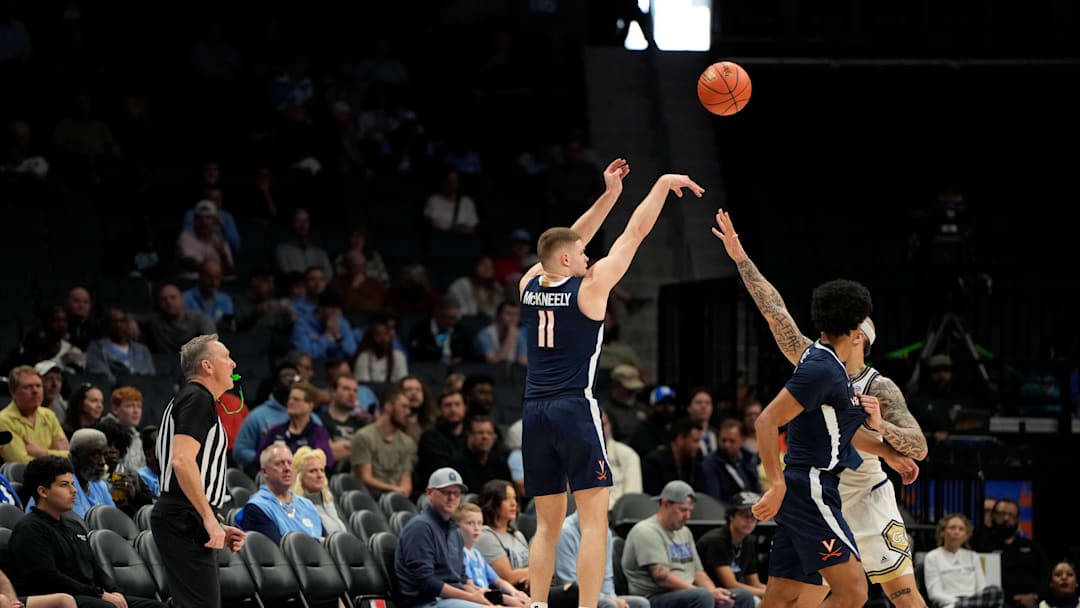 Mar 12, 2025; Charlotte, NC, USA; Virginia Cavaliers guard Isaac McKneely (11) shoots in the first half at Spectrum Center. Mandatory Credit: Bob Donnan-Imagn Images Mar 12, 2025; Charlotte, NC, USA; Virginia Cavaliers guard Isaac McKneely (11) shoots in the first half at Spectrum Center. Mandatory Credit: Bob Donnan-Imagn Images