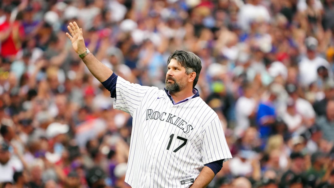 Jul 13, 2021; Denver, Colorado, USA; Colorado Rockies former player Todd Helton throws out the ceremonial first pitch prior to the 2021 MLB All Star Game at Coors Field. Mandatory Credit: Mark J. Rebilas-Imagn Images