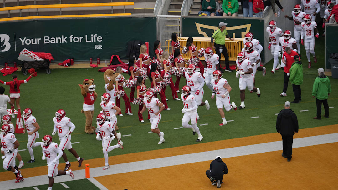 Nov 29, 2025; Waco, Texas, USA;  The Houston Cougars take the field before opening kickoff against the Baylor Bears at McLane Stadium. Mandatory Credit: Chris Jones-Imagn Images