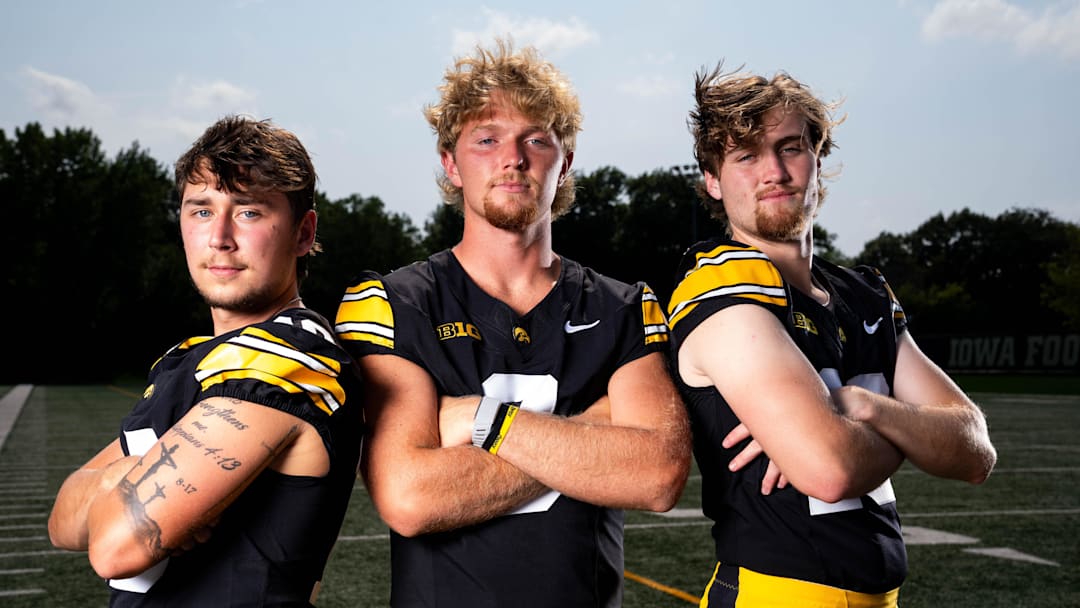 Quarterbacks Jeremy Hecklinski, Hank Brown and Jackson Stratton stand for a photo as Iowa Football hosts media day on Aug. 8, 2025, in Iowa City. Quarterbacks Jeremy Hecklinski, Hank Brown and Jackson Stratton stand for a photo as Iowa Football hosts media day on Aug. 8, 2025, in Iowa City.