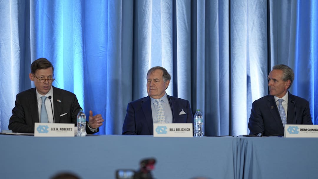 Dec 12, 2024; Chapel Hill, NC, USA; North Carolina Tar Heels chancellor Lee Roberts, North Carolina Tar Heels new head coach Bill Belichick and athletic director Bubba Cunningham at Loudermilk Center for Excellence. Mandatory Credit: Jim Dedmon-Imagn Images