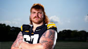 Offensive Lineman Gennings Dunker stands for a photo as Iowa Football hosts media day on Aug. 8, 2025, in Iowa City.