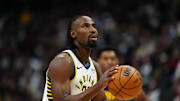 Nov 8, 2025; Denver, Colorado, USA; Indiana Pacers guard Aaron Nesmith (23) prepares to shoot a technical foul shoot in the first quarter against the Denver Nuggets at Ball Arena. Mandatory Credit: Ron Chenoy-Imagn Images