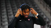 Dec 28, 2024; Denver, Colorado, USA; Detroit Pistons guard Jaden Ivey (23) looks on before the game against the Denver Nuggets at Ball Arena. Mandatory Credit: Ron Chenoy-Imagn Images