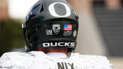 Nov 5, 2022; Boulder, Colorado, USA; Detailed view of the helmet of Oregon Ducks linebacker Justin Flowe (10) before the game against the Colorado Buffaloes at Folsom Field. Mandatory Credit: Ron Chenoy-USA TODAY Sports