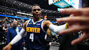 Nov 6, 2024; Denver, Colorado, USA; Denver Nuggets guard Russell Westbrook (4) following the win against the Oklahoma City Thunder at Ball Arena. Mandatory Credit: Ron Chenoy-Imagn Images