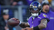 Jan 4, 2025; Baltimore, Maryland, USA; Baltimore Ravens quarterback Lamar Jackson (8) makes a pass during the first quarter against the Cleveland Browns at M&T Bank Stadium. Mandatory Credit: Mitch Stringer-Imagn Images