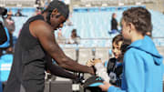 Carolina Panthers wide receiver Xavier Legette signs autographs during pregame warmups against the Tampa Bay Buccaneers at Bank of America Stadium. 