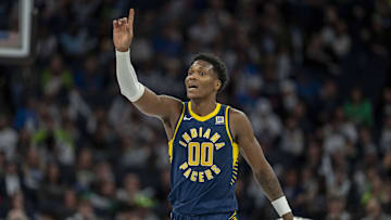 Mar 17, 2025; Minneapolis, Minnesota, USA;  Indiana Pacers guard Bennedict Mathurin (00) reacts to a foul called against the Minnesota Timberwolves in the first half at Target Center. Mandatory Credit: Jesse Johnson-Imagn Images