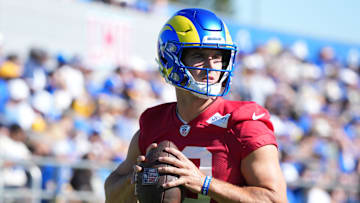 Jul 23, 2025; Los Angeles, CA, USA; Los Angeles Rams quarterback Stetson Bennett (13) throws the ball during training camp at Loyola Marymount University. Mandatory Credit: Kirby Lee-Imagn Images