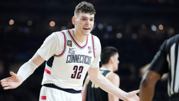 Connecticut Huskies center Donovan Clingan (32) reacts to a call during the NCAA Men’s Basketball Tournament Championship against the Purdue Boilermakers, Monday, April 8, 2024, at State Farm Stadium in Glendale, Ariz.