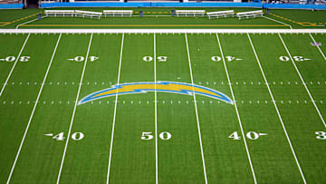 Nov 17, 2024; Inglewood, California, USA; The Los Angeles Chargers bolt logo at midfield at SoFi Stadium. Mandatory Credit: Kirby Lee-Imagn Images