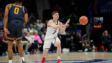 Mar 11, 2025; Charlotte, NC, USA; Virginia Tech Hokies guard Brandon Rechsteiner (7) passes the ball in the first half at Spectrum Center. Mandatory Credit: Bob Donnan-Imagn Images