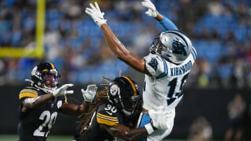 Aug 27, 2021; Charlotte, North Carolina, USA; Carolina Panthers wide receiver Keith Kirkwood (18) is hit by Pittsburgh Steelers running back Pete Guerrerio (30) during a pass play during the second half at Bank of America Stadium. Mandatory Credit: Jim Dedmon-USA TODAY Sports