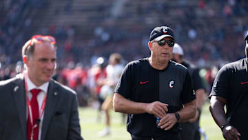 Cincinnati Bearcats head coach Scott Satterfield walks off the field after the NCAA football game between the Cincinnati Bearcats and UCF Knights at Nippert Stadium in Cincinnati on Oct. 11, 2025.