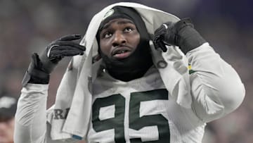 Green Bay Packers defensive tackle Devonte Wyatt (95) heads to the locker room during the third quarter of their game Sunday, December 29, 2024 at U.S. Bank Stadium in Minneapolis, Minnesota. The Minnesota Vikings beat the Green Bay Packers 27-25.