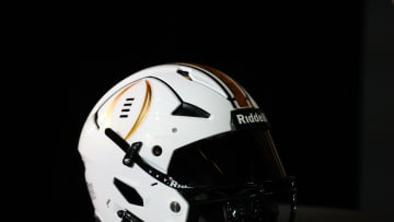 Jan 7, 2024; Houston, TX, USA; A helmet with the College Football Playoff logo at the CFP National Championship Head Coaches press conference at JW Marriot Houston by the Galleria. Mandatory Credit: Kirby Lee-USA TODAY Sports