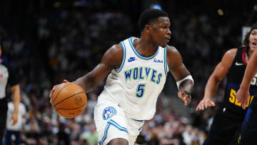 May 19, 2024; Denver, Colorado, USA; Minnesota Timberwolves guard Anthony Edwards (5) drives at the