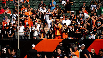 Cincinnati Bengals fan clap as Cincinnati Bengals head coach Zac Taylor speaks over the PA system during Bengals Camp practice at Paycor Stadium in Cincinnati on Aug. 2, 2025.