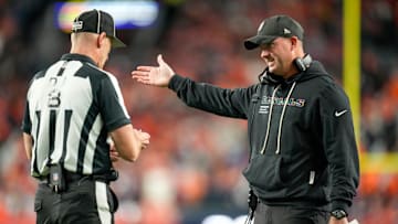 Cincinnati Bengals head coach Zac Taylor talks with a referee in the second quarter of the NFL Week 4 Monday Night Football game between the Denver Broncos and the Cincinnati Bengals at Empower Field at Mile High in Denver on Monday, Sept. 29, 2025.