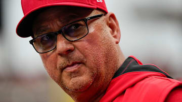 Cincinnati Reds manager Terry Francona (77) looks down the dugout