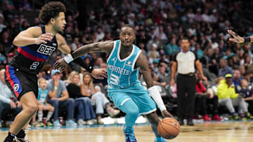 Oct 27, 2023; Charlotte, North Carolina, USA; Charlotte Hornets guard Terry Rozier (3) drives  against Cade Cunningham of the Detroit Pistons