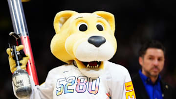 Feb 5, 2025; Denver, Colorado, USA; Denver Nuggets mascot Rocky performs in the second half against the New Orleans Pelicans at Ball Arena. Mandatory Credit: Ron Chenoy-Imagn Images