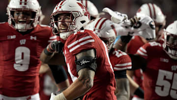 Wisconsin safety Preston Zachman (14) celebrates his interception during overtime of their game Saturday, November 18, 2023 at Camp Randall Stadium in Madison, Wisconsin. Wisconsin beat Nebraska 24-17 in overtime.
