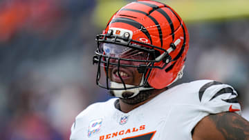 Cincinnati Bengals offensive tackle Orlando Brown Jr. (75) stretches before the first quarter of the NFL Week 4 Monday Night Football game between the Denver Broncos and the Cincinnati Bengals at Empower Field at Mile High in Denver on Monday, Sept. 29, 2025.