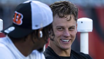 Sep 25, 2023; Cincinnati, Ohio, USA; Cincinnati Bengals quarterback Joe Burrow (9) smiles while speaking with Cincinnati Bengals wide receiver Ja'Marr Chase (1) before stretching for the NFL game between the Cincinnati Bengals and Los Angeles Rams at Paycor Stadium. Mandatory Credit: Albert Cesare-Imagn Images