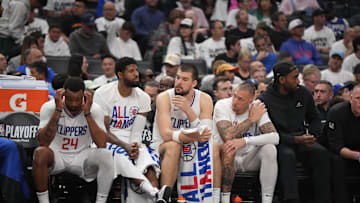 May 1, 2024; Los Angeles, California, USA; LA Clippers guard Norman Powell (24), forward Paul George (13), center Ivica Zubac (40), center Daniel Theis (10) and forward Kawhi Leonard (2) react in the second half during game five of the first round for the 2024 NBA playoffs at Crypto.com Arena. Mandatory Credit: Kirby Lee-Imagn Images