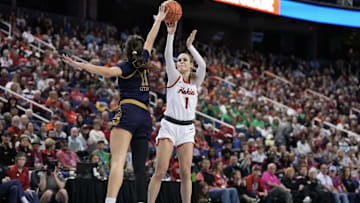Mar 9, 2024; Greensboro, NC, USA; Notre Dame Fighting Irish guard Sonia Citron (11) blocks the attempted shot of Virginia Tech Hokies guard Carleigh Wenzel (1) in the first half at Greensboro Coliseum. Mandatory Credit: David Yeazell-Imagn Images