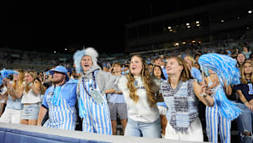 Nov 8, 2025; Chapel Hill, North Carolina, USA;  North Carolina Tar Heels fans cheer in the third quarter at Kenan Stadium. Mandatory Credit: Bob Donnan-Imagn Images