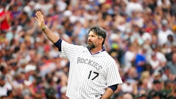 Jul 13, 2021; Denver, Colorado, USA; Colorado Rockies former player Todd Helton throws out the ceremonial first pitch prior to the 2021 MLB All Star Game at Coors Field. Mandatory Credit: Mark J. Rebilas-Imagn Images