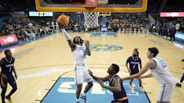 Dec 17, 2024; Los Angeles, California, USA; UCLA Bruins guard Dominick Harris (8) shoots the ball in the second half against the Prairie View A&M Panthers at Pauley Pavilion presented by Wescom. Mandatory Credit: Kirby Lee-Imagn Images