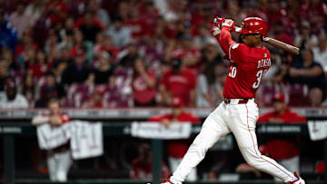Cincinnati Reds left fielder Will Benson (30) hits an RBI base hit in the third inning of the MLB game between Cincinnati Reds and Minnesota Twins at Great American Ball Park in Cincinnati on Wednesday, June 18, 2025.