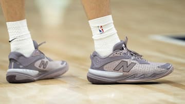 Dallas Mavericks forward Cooper Flagg wears the New Balance Hesi Low v2.