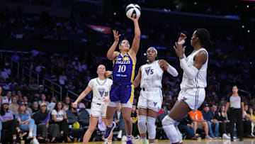 Jun 9, 2025; Los Angeles, California, USA; LA Sparks guard Kelsey Plum (10) shoots the ball against Golden State Valkyries guard Julie Vanloo (35), forward Kayla Thornton (5) and center Temi Fagbenle (14) in the first half at Crypto.com Arena. Mandatory Credit: Kirby Lee-Imagn Images