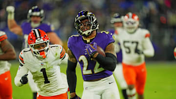 Jan 4, 2025; Baltimore, Maryland, USA; Baltimore Ravens running back Derrick Henry (22) runs for a touchdown during the fourth quarter against the Cleveland Browns at M&T Bank Stadium. Mandatory Credit: Mitch Stringer-Imagn Images