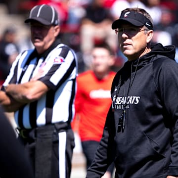 Cincinnati Bearcats head coach Scott Satterfield walks the field during the University of Cincinnati annual Red and Black Spring football game and practice at Nippert Stadium in Cincinnati on Saturday, April 13, 2024.