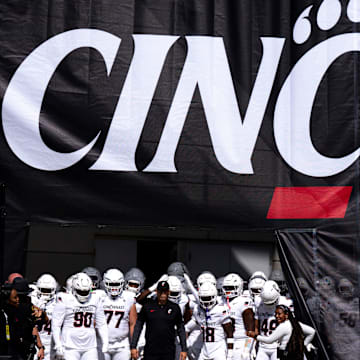 Cincinnati Bearcats head coach Scott Satterfield stands with his team before taking the field before the NCAA football game between the Cincinnati Bearcats and Bowling Green Falcons at Nippert Stadium in Cincinnati on Sept. 6, 2025.