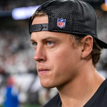 Injured Cincinnati Bengals quarterback Joe Burrow (9) walks on the field after the fourth quarter of the NFL Week 7 game between the Cincinnati Bengals and the Pittsburgh Steelers at Paycor Stadium in downtown Cincinnati on Thursday, Oct. 16, 2025. The Bengals won, 33-31.