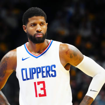 Nov 14, 2023; Denver, Colorado, USA; LA Clippers forward Paul George (13) reacts during in the second half against the Denver Nuggets at Ball Arena. Mandatory Credit: Ron Chenoy-USA TODAY Sports