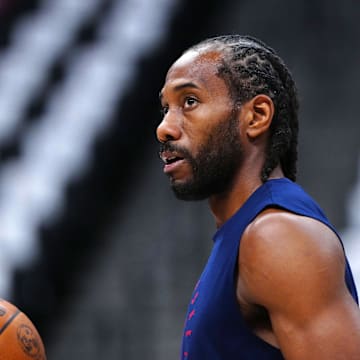 May 3, 2025; Denver, Colorado, USA; LA Clippers forward Kawhi Leonard (2) warms up before the game against the Denver Nuggets during game seven of first round for the 2025 NBA Playoffs at Ball Arena. Mandatory Credit: Ron Chenoy-Imagn Images