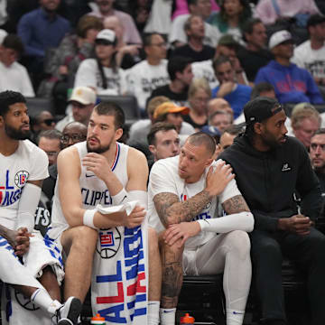 May 1, 2024; Los Angeles, California, USA; LA Clippers guard Norman Powell (24), forward Paul George (13), center Ivica Zubac (40), center Daniel Theis (10) and forward Kawhi Leonard (2) react in the second half during game five of the first round for the 2024 NBA playoffs at Crypto.com Arena. Mandatory Credit: Kirby Lee-Imagn Images